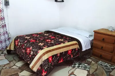 Cama o camas de una habitación en Tu Casita de descanso en Santa María