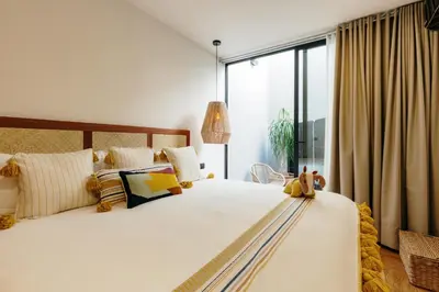 Cama o camas de una habitación en Majagua Hotel Boutique -Adults Only