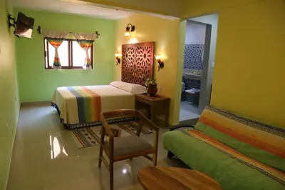 Cama o camas de una habitación en Suites Cárdon