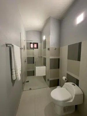 Un baño de Suites Cárdon