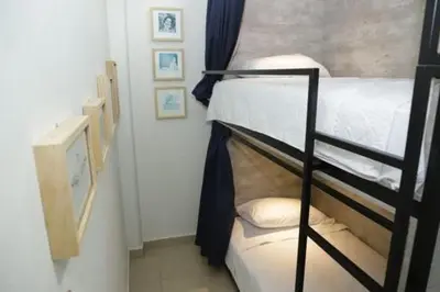 Cama o camas de una habitación en HOSTAL XAO