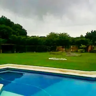 Piscina en o cerca de La Casa del Kiosco Azul Independiente Alberca Mascotas Gran Jardín