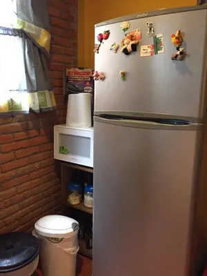 Una cocina o zona de cocina en La Casa del Kiosco Azul Independiente Alberca Mascotas Gran Jardín