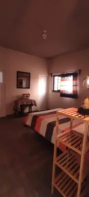 Cama o camas de una habitación en Casa de huéspedes con lo que necesitas para ti
