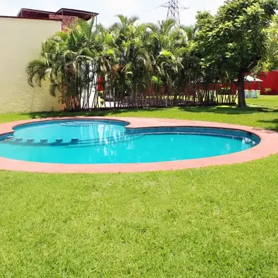 Casa Palmera con Aire acondicionado Alberca Wifi cocina y TV