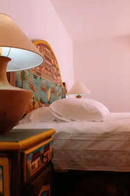 Cama o camas de una habitación en Hotel Rosa Mexicano