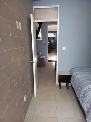 Cama o camas de una habitación en Apartamento a minutos caminando del Aeropuerto CDMX Terminal 1