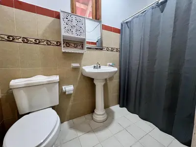Un baño de Huitzilin Hostal