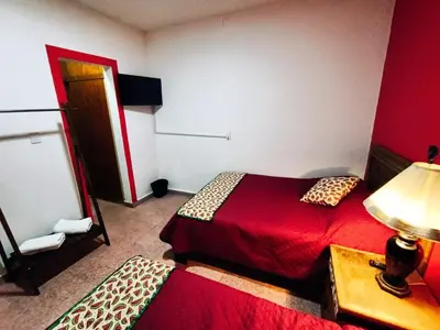 Cama o camas de una habitación en Posada Casa Mexicana Jamaica