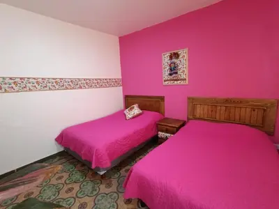 Cama o camas de una habitación en Posada Casa Mexicana Jamaica