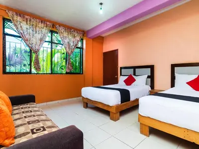 Cama o camas de una habitación en Villas el Paraíso, El Rollo