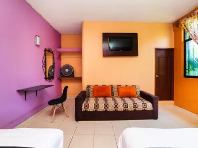 Cama o camas de una habitación en Villas el Paraíso, El Rollo