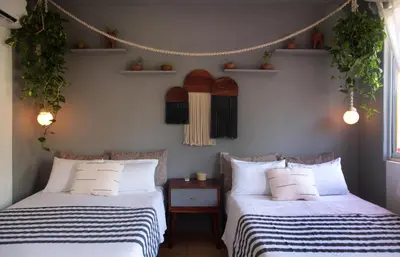 Cama o camas de una habitación en Hotel San Martin La Punta