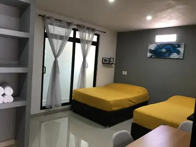 Cama o camas de una habitación en HOTEL NUEVA LUNA