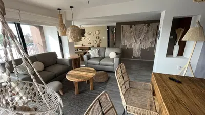 Zona de estar de Zen Suites by Regente