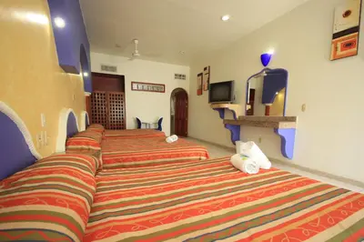 Una televisión o centro de entretenimiento en Hotel Xestal