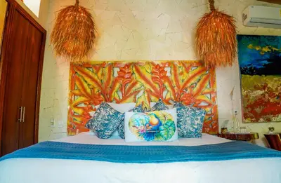 Cama o camas de una habitación en Muúnek Hotel Boutique Art & Spa, adults only