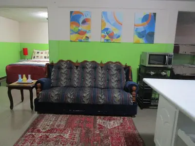 Zona de estar de Céntrico loft Boho chic con terraza, Wifi, cocina