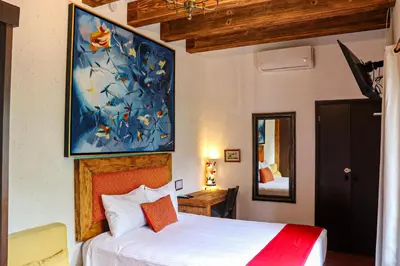 Cama o camas de una habitación en Casa Real Coyoacán