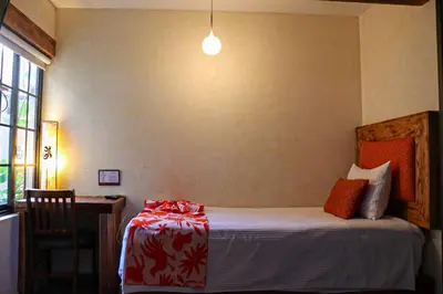 Cama o camas de una habitación en Casa Real Coyoacán