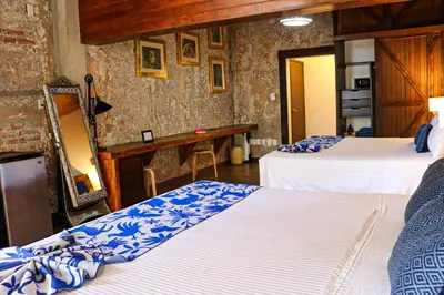 Cama o camas de una habitación en Casa Real Coyoacán