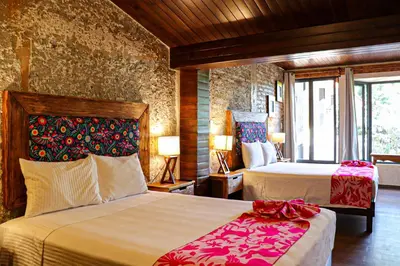 Cama o camas de una habitación en Casa Real Coyoacán
