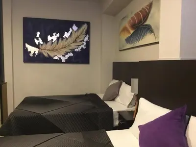 Cama o camas de una habitación en Hotel Tao