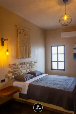 Cama o camas de una habitación en relax hotelito