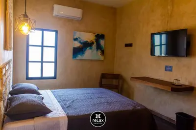 Cama o camas de una habitación en relax hotelito