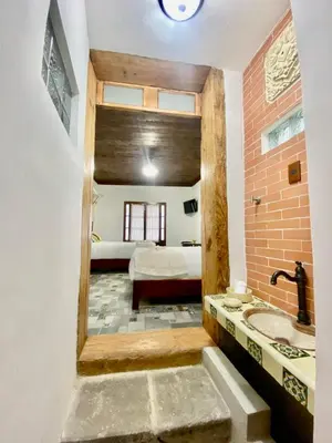 Cama o camas de una habitación en Hotel Boutique Los Ángeles