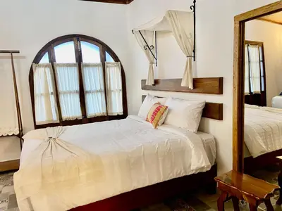 Cama o camas de una habitación en Hotel Boutique Los Ángeles
