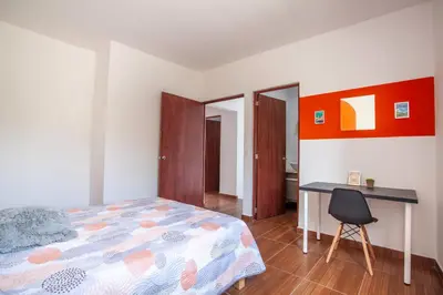 Cama o camas de una habitación en Casa con alberca privada y jardin