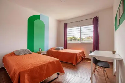 Cama o camas de una habitación en Casa con alberca privada y jardin