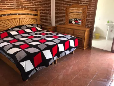 Cama o camas de una habitación en Cabañas El Manantial