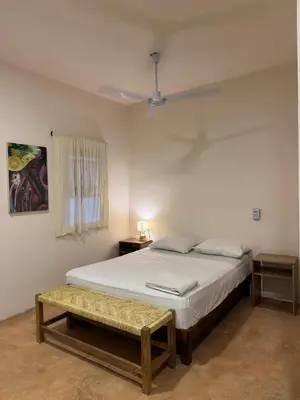 Cama o camas de una habitación en La Punta