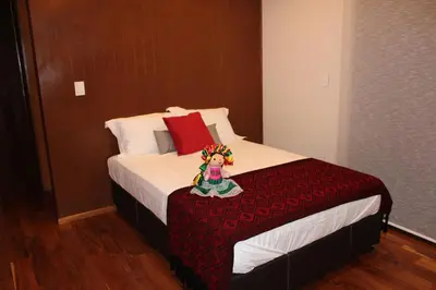 Cama o camas de una habitación en Casa Luna Coyoacan