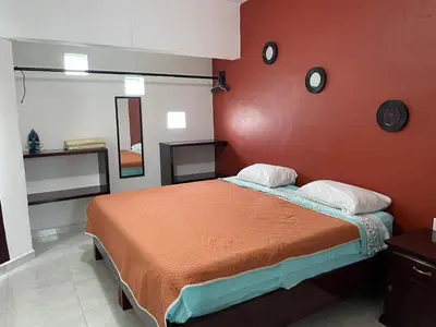 Cama o camas de una habitación en Sensity Home Preciosa y espaciosa casa todos los servicios 5 min del CIS