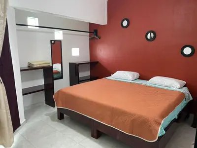 Cama o camas de una habitación en Sensity Home Preciosa y espaciosa casa todos los servicios 5 min del CIS