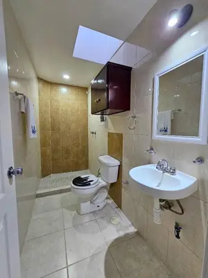 Un baño de Sensity Home Departamento 4, Confortable y céntrico todos los servicios
