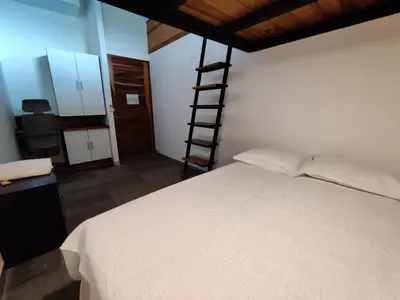 Cama o camas de una habitación en Casa Ilhe Ha