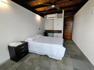 Cama o camas de una habitación en Casa Ilhe Ha