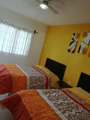 Cama o camas de una habitación en quintaolivos Jardín y Alberca!