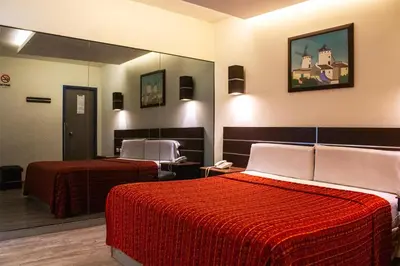 Cama o camas de una habitación en HOTEL MIRAMAR