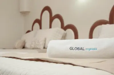 Cama o camas de una habitación en Global Express Puebla - FINSA