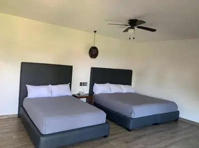 Cama o camas de una habitación en Mar De Estrellas - Hotel