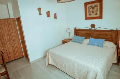 Cama o camas de una habitación en Hotel Mansión Chiapa