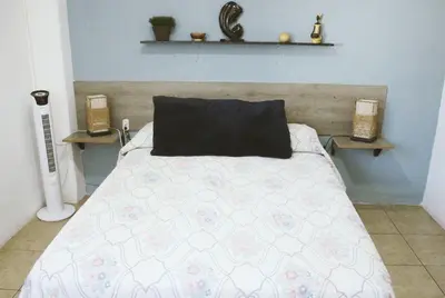 Cama o camas de una habitación en Cómodo y Céntrico Departamento familiar