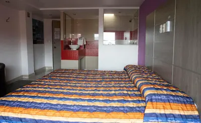 Cama o camas de una habitación en Hotel Rossel Plaza