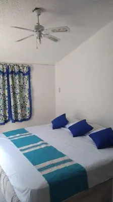 Cama o camas de una habitación en Casa en la zona de Acapulco diamante
