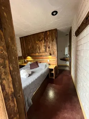 Cama o camas de una habitación en La Misión Hotel Chignahuapan